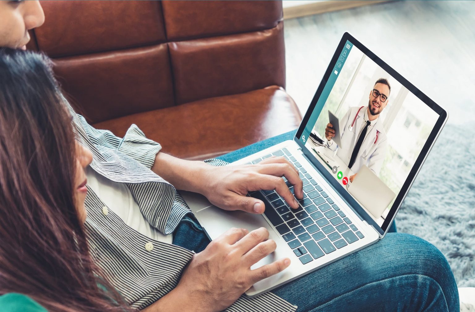 two patients communicating with their doctor through a video call